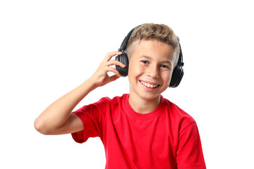 Boy in red t-shirt with headphones isolated on white background