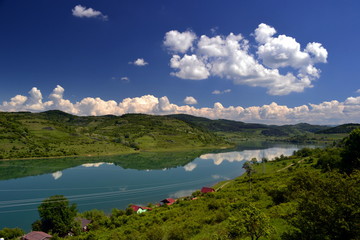 Obraz premium landscape with a lake between the hills