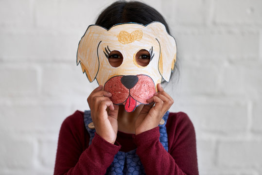 Cute indian girl with homemade animal mask