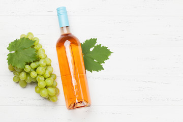 Rose wine bottle and grape