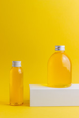 Cosmetics on a yellow background. Minimalism. Skincare.