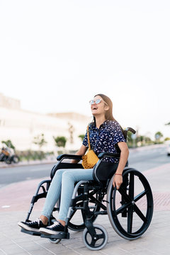 Portrait of beautiful woman on wheelchair