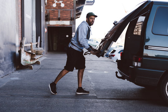 Man closes trunk