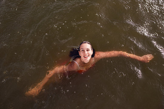 woman swimming in the river.