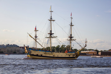 Fototapeta na wymiar Old Russian military sailing ship Poltava at the parade in Saint Petersburg in the Neva River