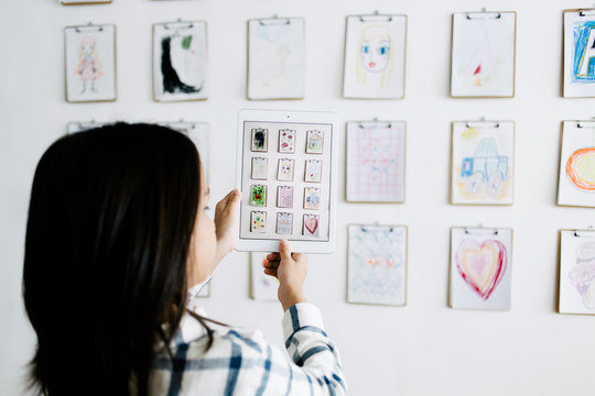 Kid making a picture with tablet