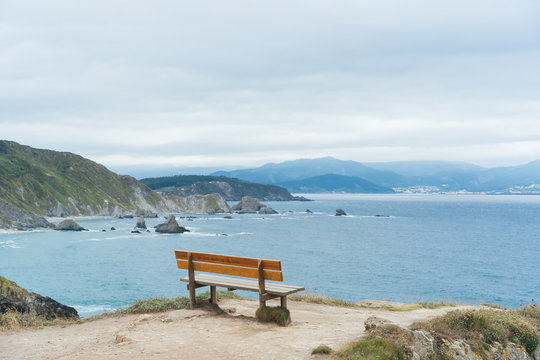 A Girl Sights The Ocean From a Cliff. The Best Bank Of The World.