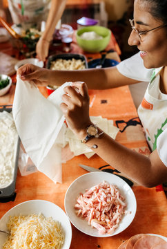 Mother and daughter cooking at home