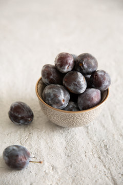 Damson plum in bowl