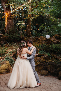 Wedding Couple Dancing in Forest