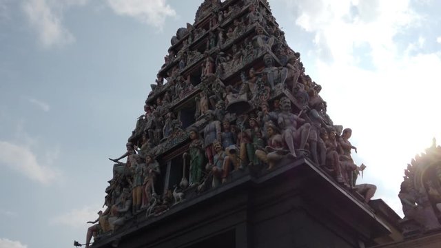 The Sri Mariamman Temple, Singapore's oldest Hindu temple is located in the Chinatown district. Hindu religion in Singapore. Architectural detail of ancient Hindu temple.