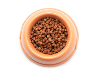 Natural Dry brown Cat Food in Plastic Bowl isolated on white Background - top View 