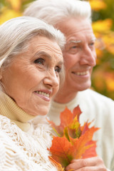 Portrait of beautiful senior couple relaxing in the park