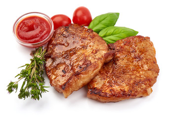 Fried juicy pork steak, isolated on white background