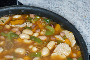 Pork tenderloin stewed in medaillons with vegetables and spices