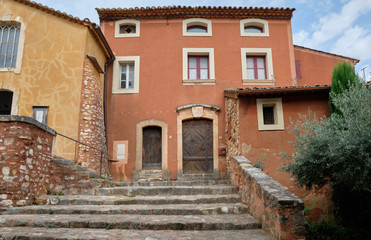 Fototapeta na wymiar Ochre-coloured buildings in Roussillon, France