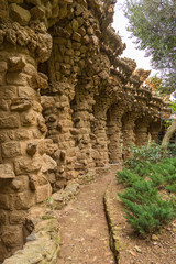 Fototapeta na wymiar Stone columns in Park Guell, Barcelona, Spain.