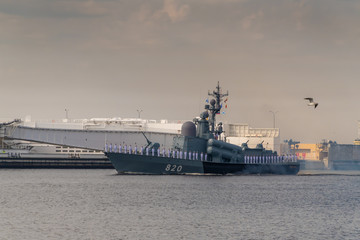 Small rocket ship runs along Kronstadt during the celebration of the Day of the Navy. 28 July 2019.