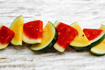 watermelon red and yellow sliced on white background