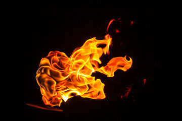 FLAMES OF FIRE ON BLACK BACKGROUND