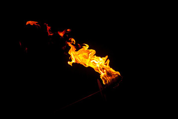 FLAMES OF FIRE ON BLACK BACKGROUND