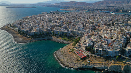 Fototapeta premium Aerial drone photo of famous dense populated district of Piraeus, Piraiki or Freatida, Attica, Greece