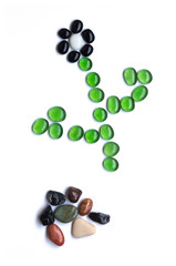 A flower made from sea glass stones, on white background