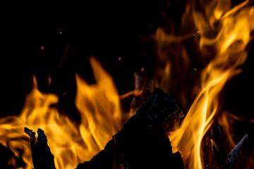 strong fire flames on black isolated background