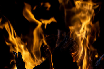 strong fire flames on black isolated background