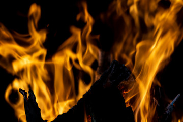 strong fire flames on black isolated background