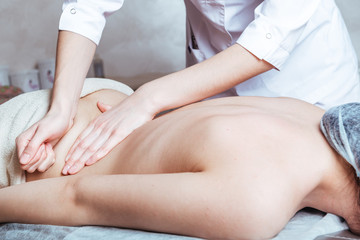 women's hands doing massage at the Spa