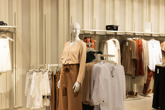 Women's clothes, on hangers in stores. Shopping Concept,