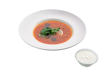 Traditional solyanka sour soup isolated on white