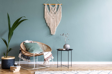 Boho style living room with rattan armchair, macrame and exotic plant - obrazy, fototapety, plakaty