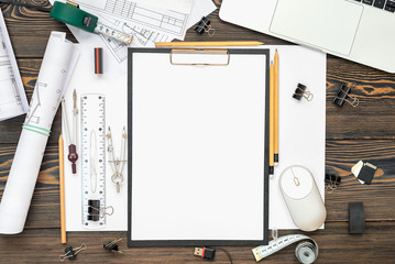 Architectural plans, pencil and ruler on the table. Place for your text