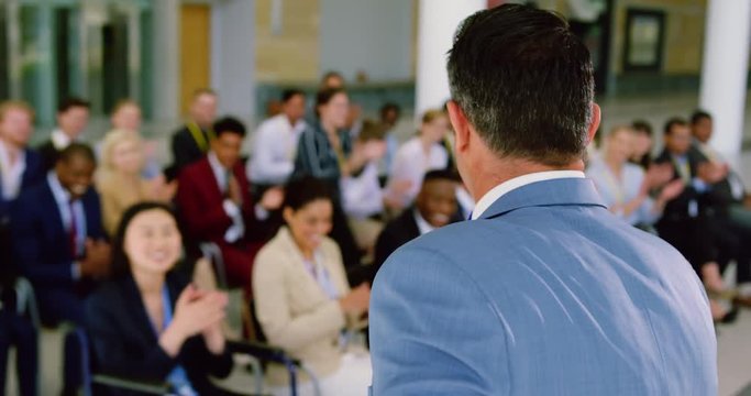 male speaker speaks in a business seminar