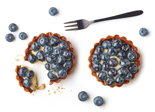 blueberry tart on white background