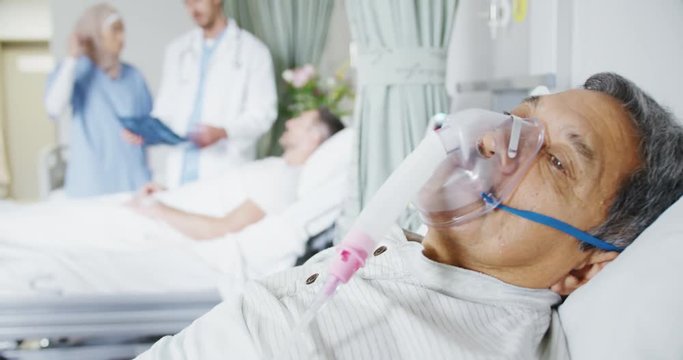 Midle aged patient lying in hospital bed 4k