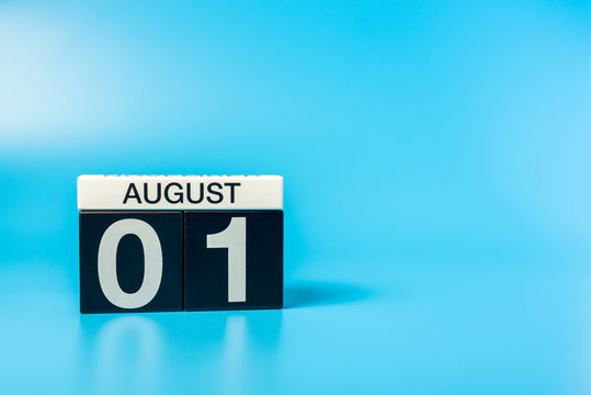 August 1st. Image of 1 august color calendar on blue background. Summer day. Empty space for text