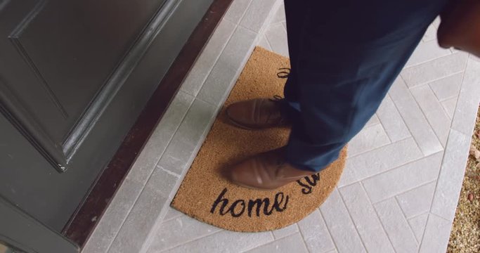 Man entering in a comfortable home 4k