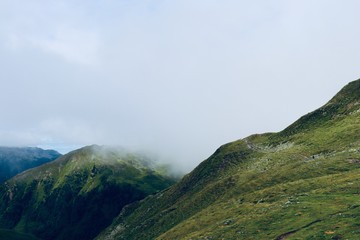 Fototapeta na wymiar Cloudy mountain panorama