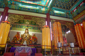 George Town/Malaysia-27.11.2017:The Buddha statue and candles in the temple