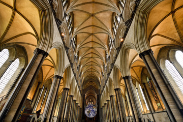 Vaulted ceiling of nave with pillars and upper clerestory of medieval Salisbury Cathedral looking...
