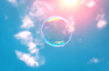 soap bubbles into the sunset with beautiful bokeh.close-up