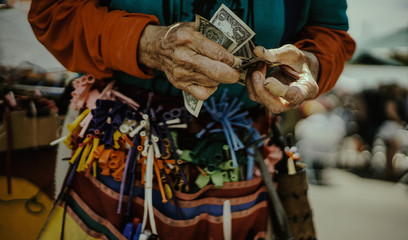Baloon Man counting money