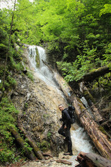 A tourist in the beautiful gorges of the Slovak Paradise National Park