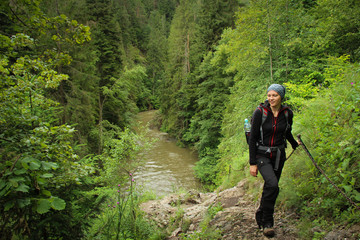 Obraz premium A tourist in the beautiful gorges of the Slovak Paradise National Park