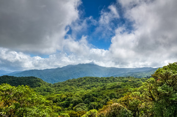 Obraz premium View over the canopy surrounding the Arenal volcano, Monteverde, Costa rica