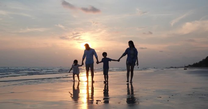 Asian family happy travel on the beach summer together in holiday. Concept of family, travel and relation. 4k resolution.