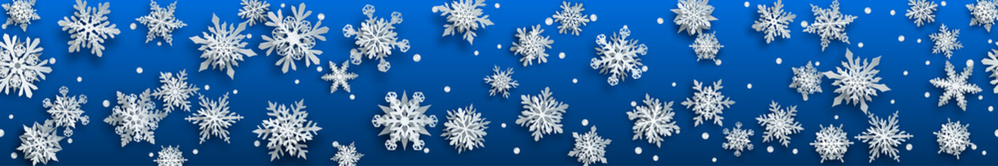 Fototapeta na wymiar Christmas banner of white complex paper snowflakes with soft shadows on blue background. With horizontal repetition